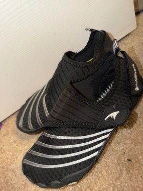 QuickShoe Black Slip-On Water Shoes with Silver Stripes